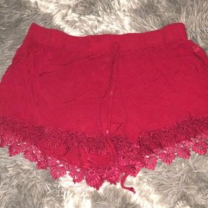 Magenta flowy shorts with tie.